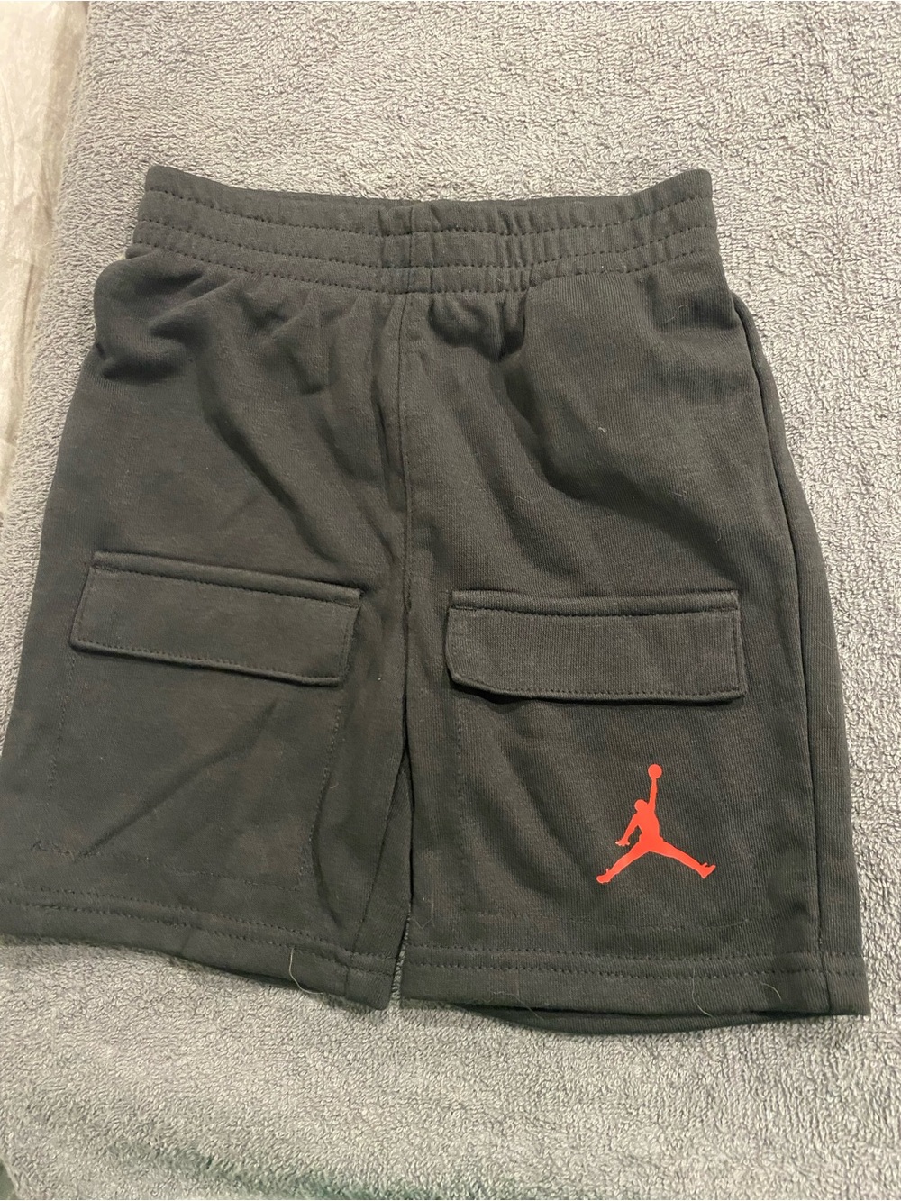 Jordan Black Shorts with Red Jumpman Logo. 4T